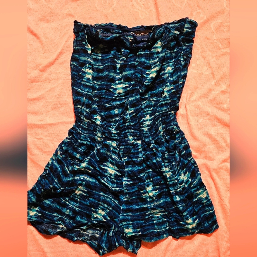 Tank top Shorts, one piece. Blue color with some white.